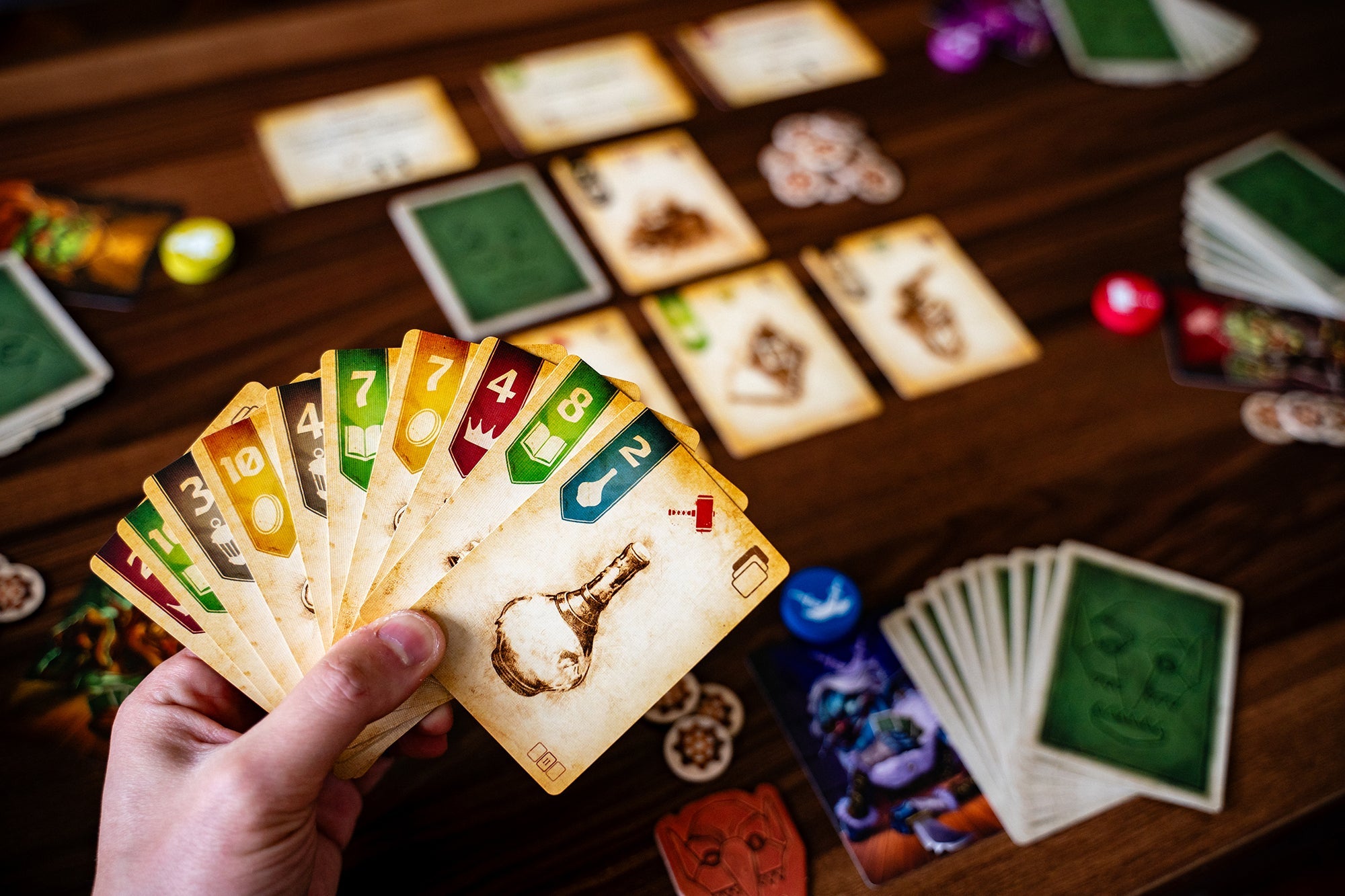 Hand of Goblin Vaults loot cards fanned out during play